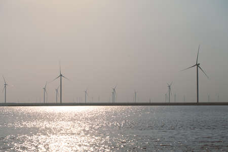 Modern electric mills and the sea.