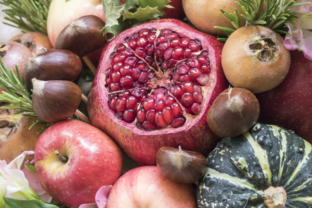 Bouquet of fresh fruits and vegetables wrapped in coarse paper closeupの写真素材