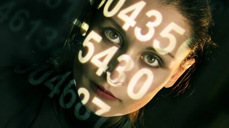 Fashion art studio photo of digital futuristic woman on black backgroungの写真素材