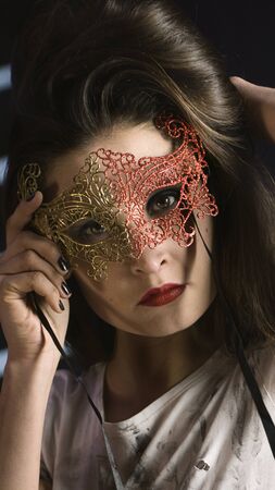 Beautiful Girl in a Carnival mask. Masqueradeの写真素材
