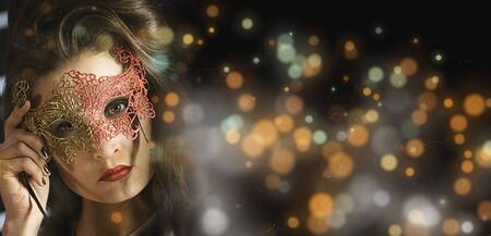 Beautiful Girl in a Carnival mask. Masqueradeの写真素材