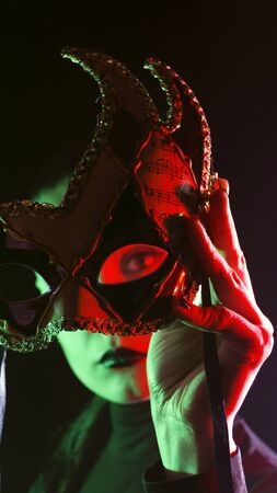Beautiful Girl in a Carnival mask. Masqueradeの写真素材