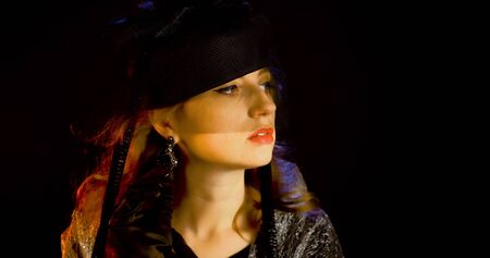 Portrait of vintage woman in classic hat. Retro styling girl. Retro portrait of a fashion elegance model. Vintage style.の写真素材
