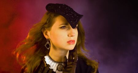 Portrait of vintage woman in classic hat. Retro styling girl Retro portrait of a fashion eleganse model. Vintage style.の写真素材