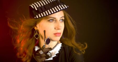 Portrait of vintage woman in classic hat. Retro styling girl Retro portrait of a fashion eleganse model. Vintage style.の写真素材