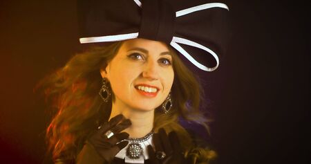 Portrait of vintage woman in classic hat. Retro styling girl Retro portrait of a fashion eleganse model. Vintage style.の写真素材