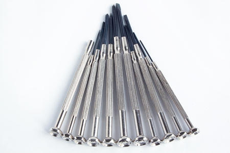 Set of clock screwdrivers on the white background. Closeupの写真素材