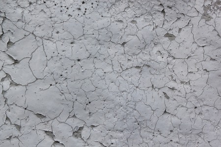 Rough painted wall with pieces of gray paint. Seamless texture. Used as a background. Copy space for your text.の写真素材