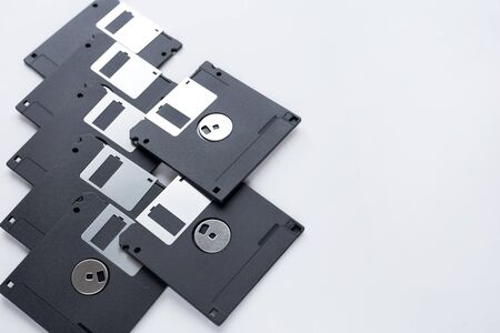 Group of flexible disks isolated on a white background. Retro technology.
