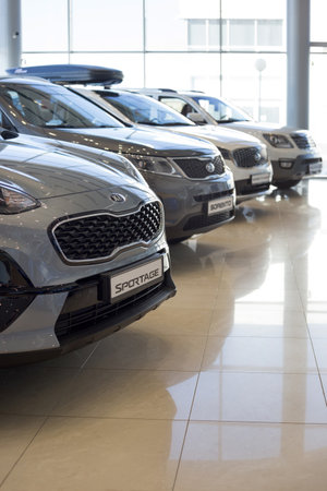 Russia, Izhevsk - July 4, 2019: New cars in the KIA showroom. Famous world brand. Prestigious...