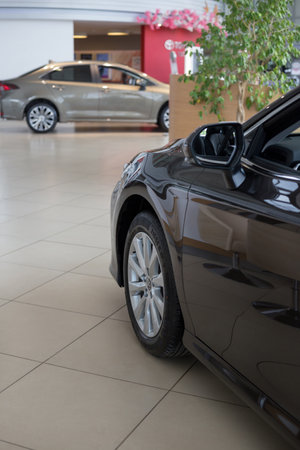 Russia, Izhevsk - July 18, 2019: New cars in the Toyota showroom. Famous world brand. Prestigious vehicles.のeditorial素材