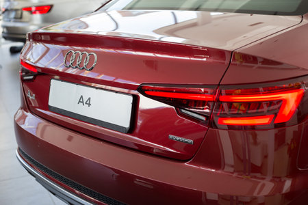 Russia, Izhevsk - September 11, 2019: New modern sedan A4 Quattro in the Audi showroom. Famous world...