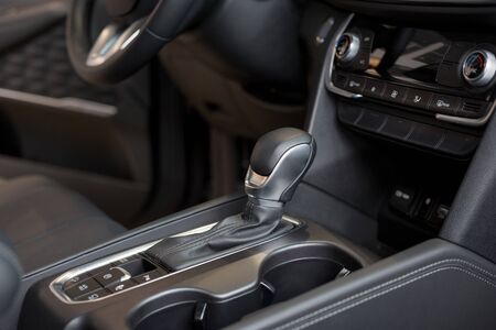 Interior of new modern car with automatic transmission. Modern transportation. For use as a background.の写真素材