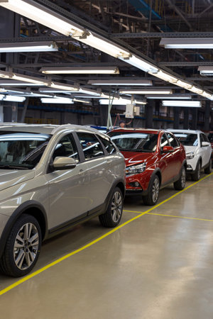 Russia, Izhevsk - December 14, 2019: LADA Automobile Plant Izhevsk, part of the AVTOVAZ Group. New modern cars Lada XRAY ready for sale. Modern transportation.のeditorial素材