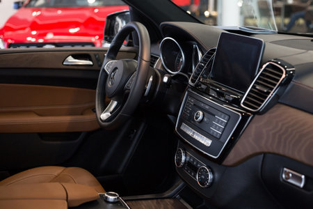 Russia, Izhevsk - February 20, 2020: Mercedes-Benz showroom. Interior of new modern GLS 350d. Famous world brand. Modern transportation.のeditorial素材