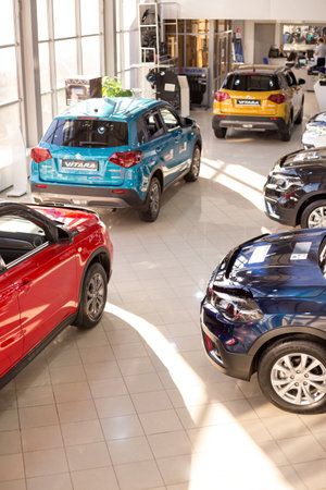 Russia, Izhevsk - March 05, 2020: Suzuki showroom. New modern cars in the dealer showroom. Famous...