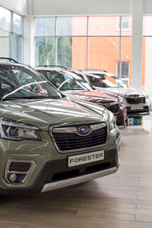Russia, Izhevsk - August 13, 2020: Subaru showroom. New modern Forester car in the dealer showroom....