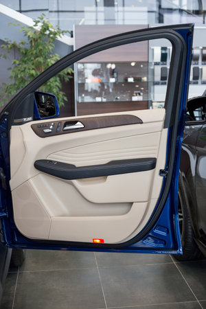 Russia, Izhevsk - February 20, 2020: Mercedes-Benz showroom. Details of car door new GLE 350d car. Famous world brand. Modern transportation.のeditorial素材