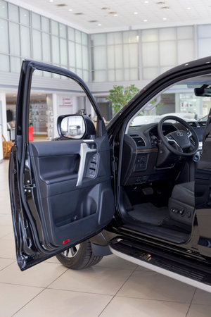 Russia, Izhevsk - September 30, 2021: Toyota showroom. Interior of new Land Cruiser Prado in dealer...