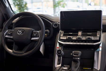 Russia, Izhevsk - September 30, 2021: Toyota showroom. Interior of new modern Land Cruiser 300 in dealer showroom. modern transportation. famous world brand.のeditorial素材