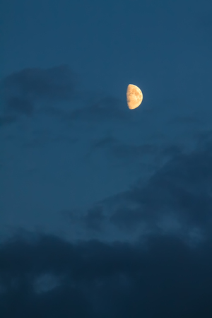 Yellow moon with clouds