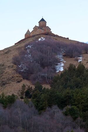 Famous Holy Trinity Church near Stepantsminda village, Georgia