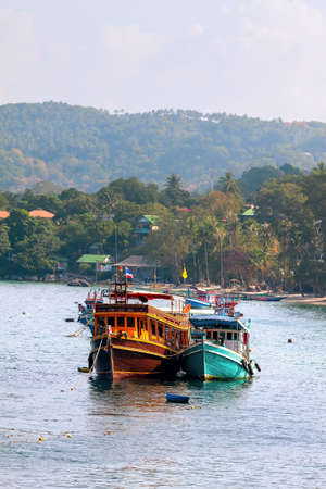 Colored sea boats on the coast of Thailand.の写真素材