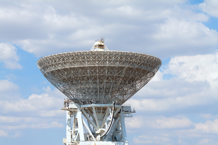 Observatory telescope with electronic white against the blue sky.の写真素材