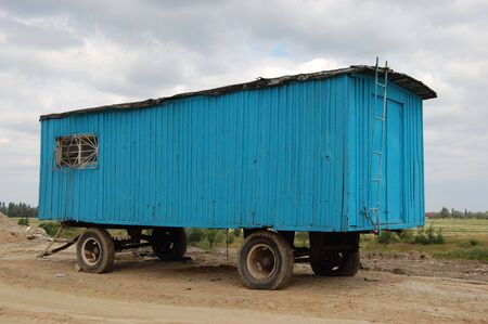 Trailer. Temporary   house for worker near construction site. Abandonedの写真素材