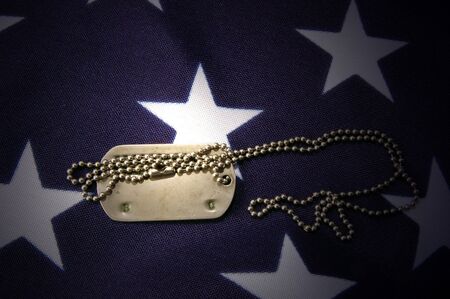 Dog tag on American Flag.Freedom is not free の写真素材
