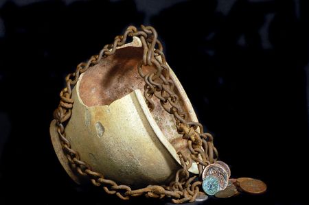 Ancient jug with coinsの写真素材