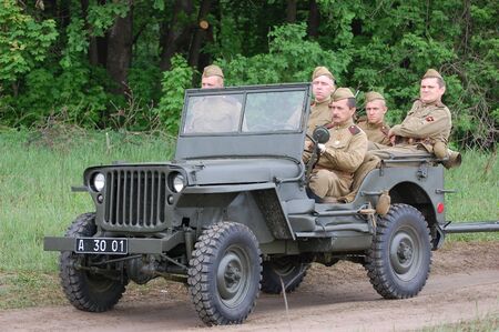KIEV, UKRAINE - MAY 10 : Members of Red Star history club wear historical Soviet uniform during historical reenactment of 1945 WWII, May 10, 2010 in Kiev, Ukraine のeditorial素材
