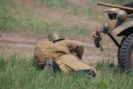 KIEV, UKRAINE - MAY 10 : A member of Red Star history club wears historical Soviet uniform during historical reenactment of 1945 WWII, May 10, 2010 in Kiev, Ukraine のeditorial素材