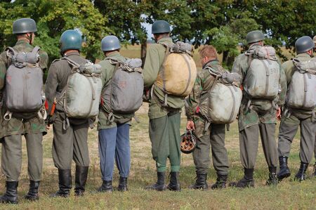 CHERNIGOW, UKRAINE - AUG 29: Members of Red Star military history club wear historical German paratrooper uniform during historical reenactment of WWII, August 29, 2010 in Chernigow, Ukraine のeditorial素材