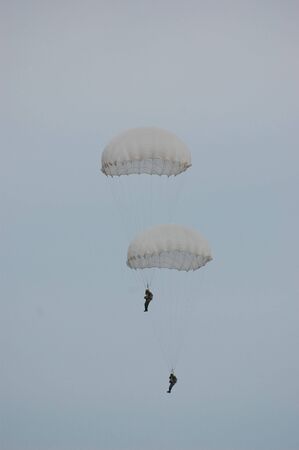 CHERNIGOW, UKRAINE - AUG 29: Members of Red Star military history club wear historical German paratrooper uniform during historical reenactment of WWII, August 29, 2010 in Chernigow, Ukraine のeditorial素材