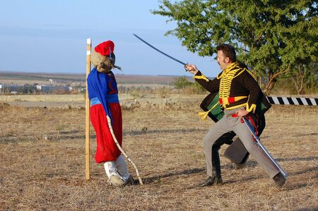 CRIMEA, UKRAINE - SEPTEMBER 26: Member of military history club ALMA wears Russian historical uniform during historical reenactment of Crimean War September 26, 2009 , Crimea, Ukraine のeditorial素材