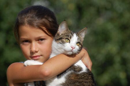 Girl with her cat の写真素材