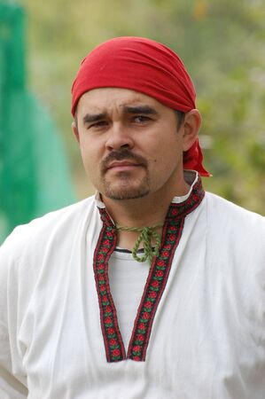 KIEV, UKRAINE - SEP 19: Participant of Festivale of medieval costume wears historical costume September 19, 2010 in Kiev, Ukraine のeditorial素材