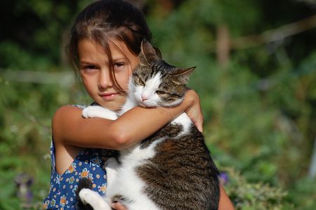Girl with her cat の写真素材