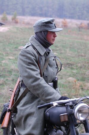 KIEV, UKRAINE - DEC 6: Members of a history club Red Star wear historical German uniforms during a WWII reenactment 'Defense Kiev' in 1943 December 6, 2009 in Kiev, Ukraine のeditorial素材
