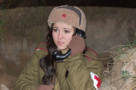 KIEV, UKRAINE - DEC 6: Member of a history club Red Star wears historical Soviet uniforms during a WWII reenactment 'Defense Kiev' in 1943 on December 6, 2009 in Kiev, Ukraine のeditorial素材