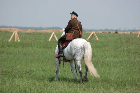 KIEV, UKRAINE - MAY 10 : A member of Red Star history club wears historical Soviet uniform during historical reenactment of 1945 WWII, May 10, 2010 in Kiev, Ukraine のeditorial素材