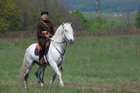 KIEV, UKRAINE - MAY 10 : A member of Red Star history club wears historical Soviet uniform during historical reenactment of 1945 WWII, May 10, 2010 in Kiev, Ukraine のeditorial素材