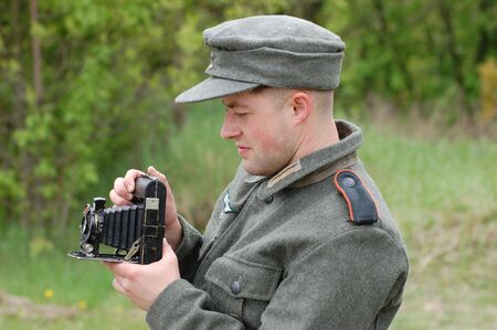 KIEV, UKRAINE - MAY 9: A member of a military history club wears a historical German uniform as he...