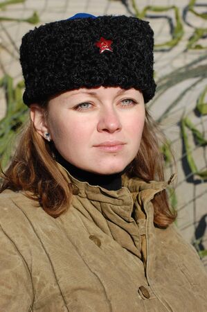 Girl wears Soviet uniform of WWII