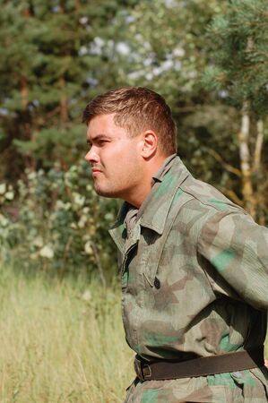 CHERNIGOW, UKRAINE - AUG 29: A member of Red Star military history club wears historical German...