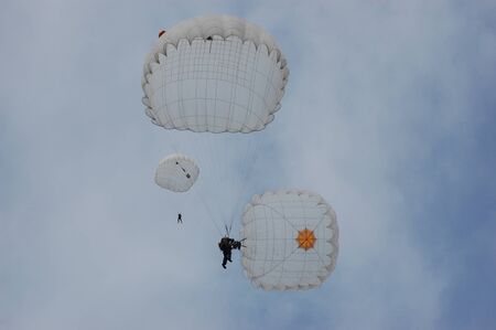CHERNIGOW, UKRAINE - AUG 29: A member of Red Star military history club wears historical German paratrooper uniform during historical reenactment of WWII, August 29, 2010 in Chernigow, Ukraine のeditorial素材