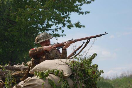 KIEV, UKRAINE - MAY 9: Member of military history club Red Star in British uniform during historical military reenactment of War in Germany of May 1945. May 9, 2009 in Kiev, Ukraineのeditorial素材