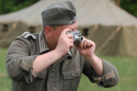 KIEV, UKRAINE, 10 MAY 2008: Member of military history club Red Star. Person in German WW2 military uniform. Historical military reenacting in Kiev, Ukraine, 8-10 May, 2008 のeditorial素材