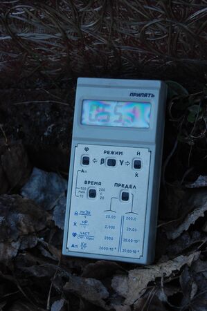 APR. 25,2009 Chernobyl area. Lost city Pripyat. Modern ruins. Radiometer on the ground.Ukraine. Kiev region.April 25,2009 のeditorial素材